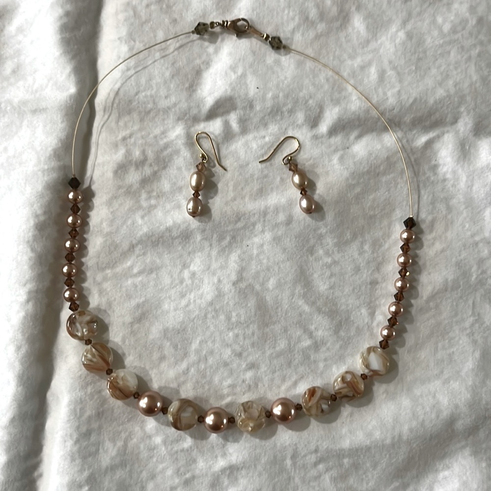 Beautiful Swarovski and Glass bead handmade necklace and earrings